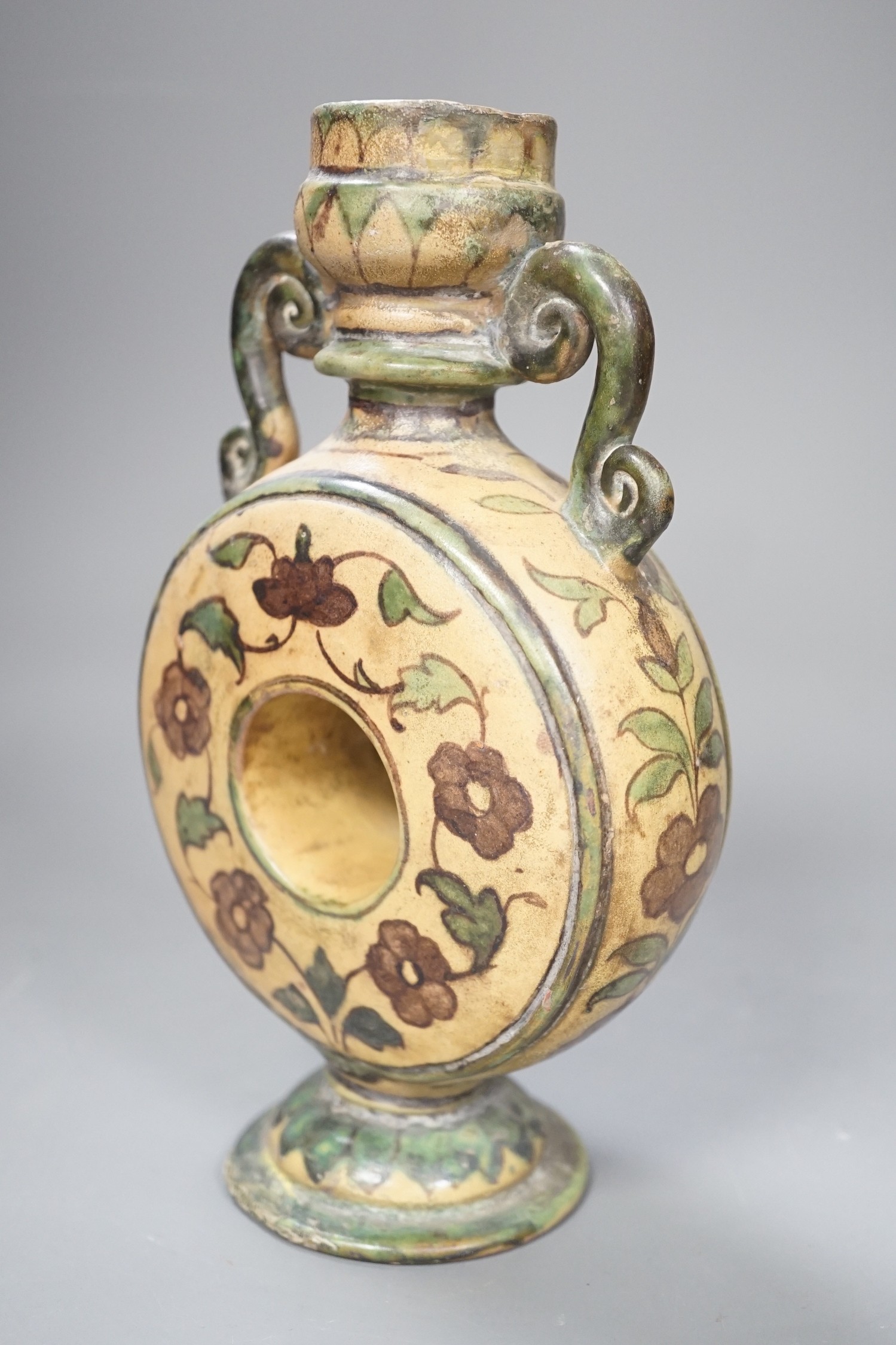 A polychrome painted terracotta vase, 20cm